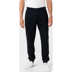 Tommy Hilfiger Spodnie dresowe Niebieski. Niebieskie spodnie męskie TOMMY HILFIGER, xl, bez wzorów, z bawełny. Za 567,95 zł.