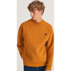 Bluza z bawełny organicznej - Żółty. Żółte bluzy męskie Reserved, s, bez wzorów, z bawełny, bez kołnierzyka, bez rękawów, bez kaptura. Za 79,99 zł.