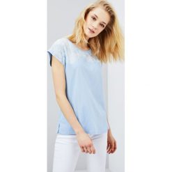 Bluzka oversize. Bluzki damskie Moodo, s, bez wzorów, bez kołnierzyka, bez rękawów. Za 9,99 zł.