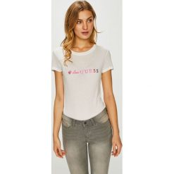 Guess Jeans - Top. Białe topy damskie marki Guess Jeans, l, z aplikacjami, z dzianiny, z okrągłym kołnierzem. Za 169,90 zł.