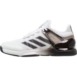 Adidas Performance ADIZERO UBERSONIC 2 Obuwie do tenisa Outdoor footwear white/core black/grey two. Białe buty sportowe męskie marki adidas Performance, z tworzywa sztucznego, bez zapięcia, outdoorowe. W wyprzedaży za 389,35 zł.