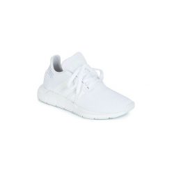Buty Dziecko adidas SWIFT RUN J. Białe trampki dziewczęce marki Adidas, bez wzorów, bez zapięcia. Za 289,00 zł.