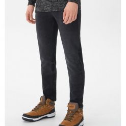 Ocieplane jeansy slim fit - Czarny. Czarne jeansy męskie regular House. Za 139,99 zł.