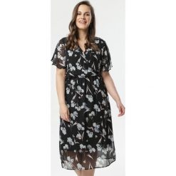 Czarna Sukienka Imaani. Czarne sukienki damskie Born2be, na co dzień, w kwiaty, bez kołnierzyka, z krótkim rękawem, krótkie, midi, rozkloszowane. Za 89,99 zł.