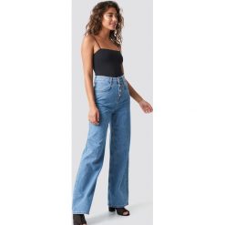 Spodnie damskie: MANGO Szerokie jeansy Romantic - Blue
