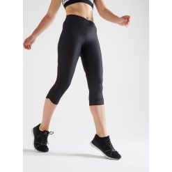 Legginsy 7/8 fitness kardio damskie 500 czarne. Czarne legginsy sportowe damskie DOMYOS, l, bez wzorów, z elastanu, na fitness i siłownię. Za 69,99 zł.