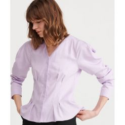 Taliowana bluzka z Tencelem™ - Fioletowy. Fioletowe bluzki damskie Reserved, bez wzorów, bez kołnierzyka, bez rękawów. W wyprzedaży za 79,99 zł.