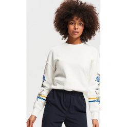 Bluza z nadrukiem - Kremowy. Białe bluzy damskie Reserved, s, z nadrukiem, bez rękawów, bez kaptura. W wyprzedaży za 49,99 zł.