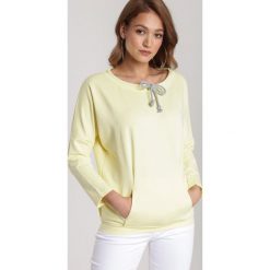 Żółta Bluza Petineira. Żółte bluzy damskie Renee, xl, bez wzorów, bez rękawów, bez kaptura. Za 59,99 zł.