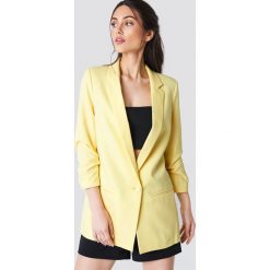 Trendyol Marynarka oversize zapinana na guzik - Yellow. Szare marynarki i żakiety damskie marki Trendyol, na co dzień, l, z poliesteru, casualowe, midi, rozkloszowane. Za 202,95 zł.