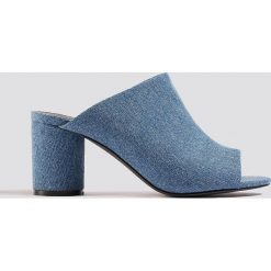 NA-KD Shoes Klapki mule z denimu - Blue. Niebieskie chodaki damskie NA-KD Shoes, z denimu. Za 121,95 zł.