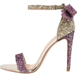 Office HARRIET Sandały na obcasie gold/pink/ombre glitter. Żółte rzymianki damskie Office, z materiału, na obcasie. Za 359,00 zł.