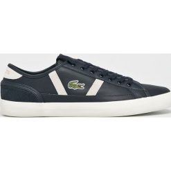 Lacoste - Buty. Niebieskie buty sportowe męskie Lacoste, ze skóry, na sznurówki. W wyprzedaży za 319,90 zł.