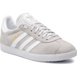 Buty adidas - Gazelle F34053 Greone/Ftwwht/Goldmt. Szare buty sportowe damskie Adidas, ze skóry, eleganckie. W wyprzedaży za 269,00 zł.