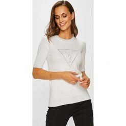 Guess Jeans - Top Helene. Białe bluzki damskie Guess Jeans, s, z nadrukiem, z elastanu, z okrągłym kołnierzem. W wyprzedaży za 219,90 zł.