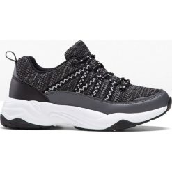 Sneakersy bonprix czarno-biały. Czarne buty sportowe damskie bonprix, bez wzorów, sportowe. Za 124,99 zł.