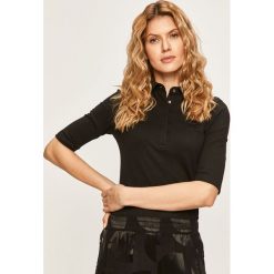 Lacoste - Polo. Czarne bluzki damskie Lacoste, s, bez wzorów, z elastanu, polo, z krótkim rękawem. W wyprzedaży za 329,90 zł.