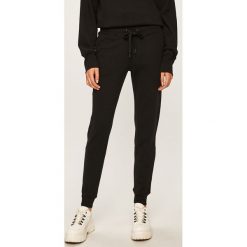 Dkny - Spodnie. Czarne spodnie damskie DKNY, s, bez wzorów, z bawełny. W wyprzedaży za 259,90 zł.