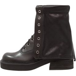 Buty zimowe damskie: See by Chloé Kozaki sznurowane nero