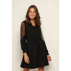 Sukienka "Samuela" w kolorze czarnym. Czarne sukienki damskie Manoukian, l, w koronkowe wzory, z koronki, midi. W wyprzedaży za 109,95 zł.