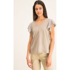 Bluzka Manila Grace Scollo T196CU. Białe bluzki damskie Manila Grace, s, bez wzorów, z elastanu, bez kołnierzyka, bez rękawów. W wyprzedaży za 339,00 zł.