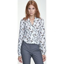 Jasna bluzka w kwiaty z kołnierzykiem. Bluzki damskie NIFE, xl, w kwiaty, z poliesteru, eleganckie, bez kołnierzyka, bez rękawów. Za 139,00 zł.