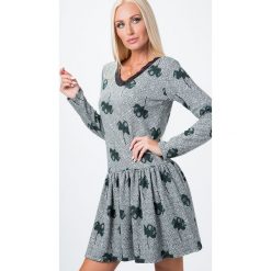 Sukienka z koronką we wzory zielona 15070. Zielone sukienki damskie Fasardi, xl, w koronkowe wzory, z koronki, bez kołnierzyka, bez rękawów. Za 49,00 zł.
