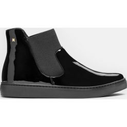 Czarne sneakersy damskie. Czarne buty sportowe damskie Kazar, bez wzorów, ze skóry, sportowe. Za 549,00 zł.