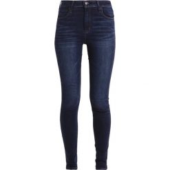 Abercrombie & Fitch HIGH RISE SUPER Jeans Skinny Fit dark. Niebieskie jeansy damskie skinny marki Abercrombie & Fitch, z elastanu. Za 369,00 zł.