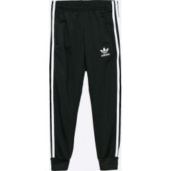 Adidas Originals - Spodnie dziecięce 128-164 cm. Czarne spodnie chłopięce marki adidas Originals, z dzianiny. W wyprzedaży za 149,90 zł.