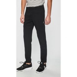 Reebok - Spodnie. Czarne spodnie męskie Reebok, m, z bawełny. W wyprzedaży za 129,90 zł.