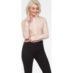 G-Star Raw - Koszula. Bluzki damskie G-Star RAW, s, bez wzorów, z elastanu, klasyczne, z klasycznym kołnierzykiem, z długim rękawem. W wyprzedaży za 129,90 zł.
