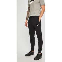 Nike Sportswear - Spodnie. Czarne spodnie męskie Nike Sportswear, na co dzień, m, bez wzorów, z bawełny, casualowe. Za 139,90 zł.
