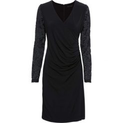 Sukienka bonprix czarny. Czarne sukienki balowe marki bonprix, w koronkowe wzory, z koronki, z kopertowym dekoltem, kopertowe. Za 99,99 zł.