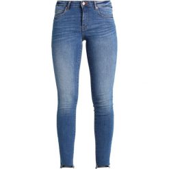 Gina Tricot EMMA JEANS Jeansy Slim Fit midblue. Niebieskie jeansy damskie relaxed fit marki Gina Tricot, z bawełny. W wyprzedaży za 126,75 zł.