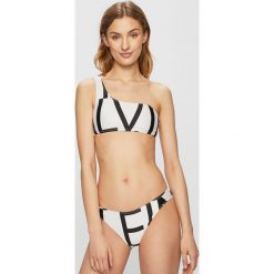 Calvin Klein Jeans - Biustonosz kąpielowy. Białe stroje kąpielowe damskie Calvin Klein Jeans, xs, bez wzorów, z elastanu. W wyprzedaży za 159,90 zł.