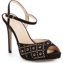 Buty damskie. Czarne klapki damskie Wittchen, bez wzorów, ze skóry, na wysokim obcasie, na platformie. W wyprzedaży za 249,90 zł.