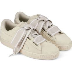Skórzane sneakersy w kolorze beżowym. Brązowe sneakersy damskie Puma, bez wzorów, na sznurówki. W wyprzedaży za 150,95 zł.