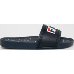 Melissa - Klapki x Fila. Niebieskie klapki damskie Melissa, bez wzorów, z materiału, bez obcasa, na obcasie. W wyprzedaży za 259,90 zł.