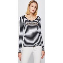 Guess Jeans - Sweter. Białe swetry damskie Guess Jeans, s, z aplikacjami, z elastanu, bez rękawów, bez kaptura. W wyprzedaży za 159,90 zł.
