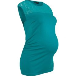 Shirt ciążowy z koronką bonprix kobaltowo-turkusowy. Niebieskie bluzki ciążowe bonprix, w koronkowe wzory, z wiskozy, bez kołnierzyka, bez rękawów. Za 44,99 zł.