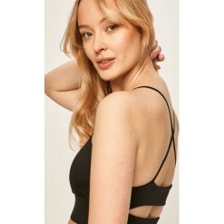 Reebok - Biustonosz sportowy. Czarne biustonosze sportowe damskie Reebok, s, bez wzorów, z poliesteru. Za 89,90 zł.