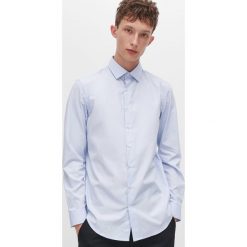 Koszula slim fit z drobnym wzorem - Niebieski. Niebieskie koszule męskie Reserved, s, bez wzorów, bez kołnierzyka, bez rękawów. Za 89,99 zł.