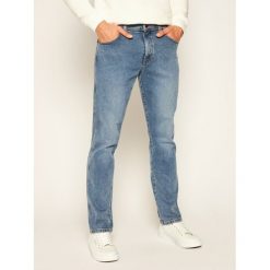 Jeansy Slim Fit Wrangler Texas W12SM511Q. Niebieskie jeansy męskie Wrangler, m, bez wzorów. W wyprzedaży za 259,00 zł.