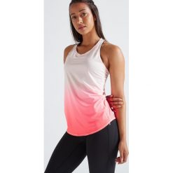 Top fitness kardio 500 damski. Różowe topy damskie DOMYOS, bez wzorów, z elastanu, bez kołnierzyka. Za 39,99 zł.