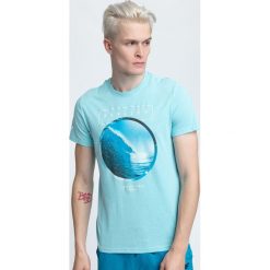 T-shirt męski TSM293 - niebieski melanż. Niebieskie koszulki męskie marki 4f, m, bez wzorów, z bawełny, bez kołnierzyka, krótkie. Za 59,99 zł.
