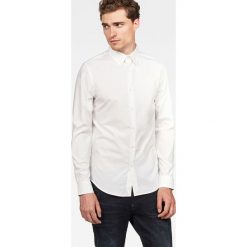 G-Star Raw - Koszula Core. Szare koszule męskie na spinki G-Star RAW, m, z bawełny, z klasycznym kołnierzykiem, z długim rękawem. W wyprzedaży za 199,90 zł.