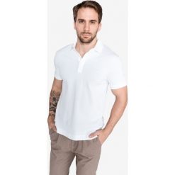 Lacoste Polo Koszulka Biały. Białe podkoszulki męskie Lacoste, s, bez wzorów, z elastanu, bez rękawów. Za 447,95 zł.