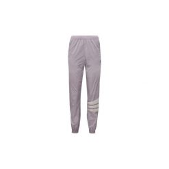 Spodnie treningowe adidas Spodnie ze zwężanymi mankietami. Fioletowe spodnie damskie Adidas. Za 174,30 zł.