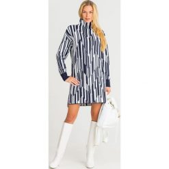 SUKIENKA BALTICO Sportmax Code. Niebieskie sukienki damskie Sportmax Code, na imprezę, xs, bez wzorów, z dzianiny, z golfem, bez rękawów, mini, asymetryczne. Za 827,40 zł.